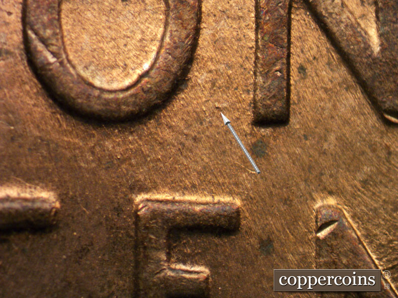Die-stage B marker on 1958D•1MM•046 (1958 Repunched Mint Mark).