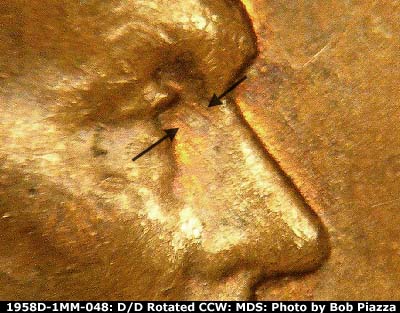 Die-stage B marker on 1958D•1MM•048 (1958 Repunched Mint Mark).