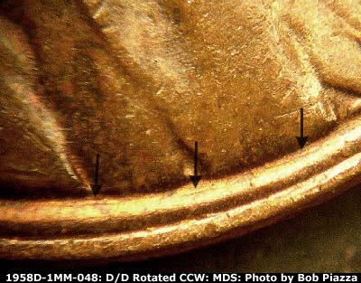 Die-stage B marker on 1958D•1MM•048 (1958 Repunched Mint Mark).