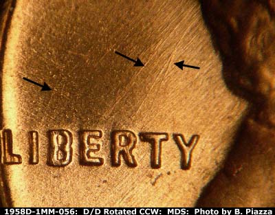 Die-stage B marker on 1958D•1MM•056 (1958 Repunched Mint Mark).