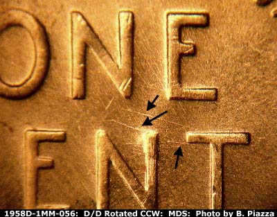 Die-stage B marker on 1958D•1MM•056 (1958 Repunched Mint Mark).