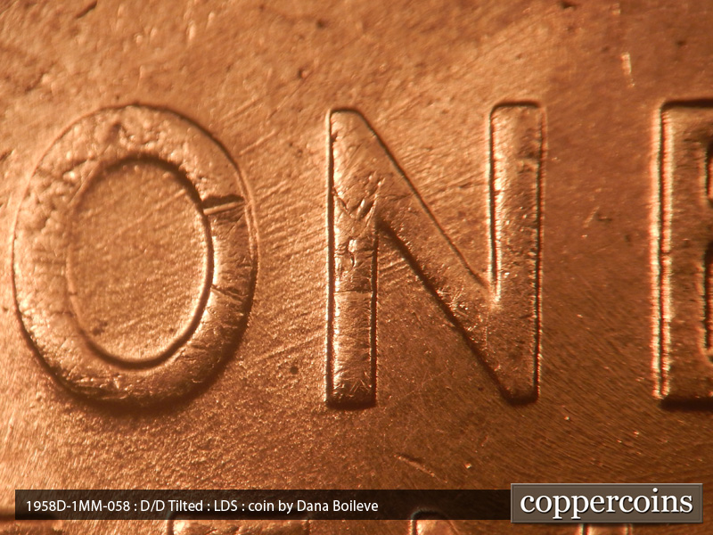 Die-stage C marker on 1958D•1MM•058 (1958 Repunched Mint Mark).