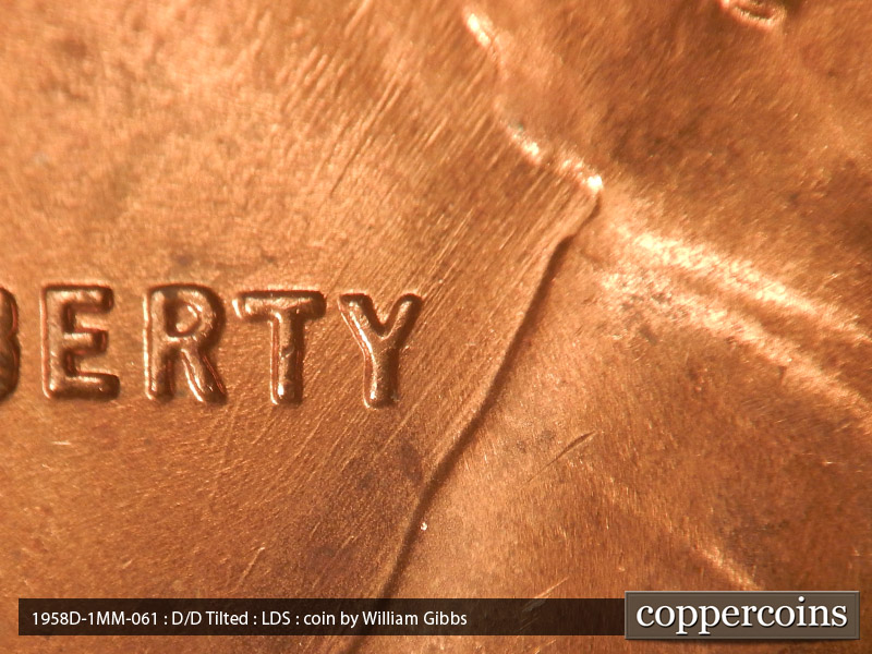 Die-stage C marker on 1958D•1MM•061 (1958 Repunched Mint Mark).