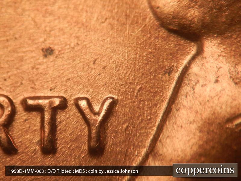 Die-stage B marker on 1958D•1MM•063 (1958 Repunched Mint Mark).