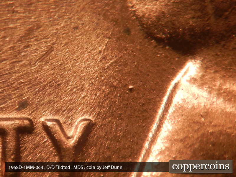 Die-stage B marker on 1958D•1MM•064 (1958 Repunched Mint Mark).
