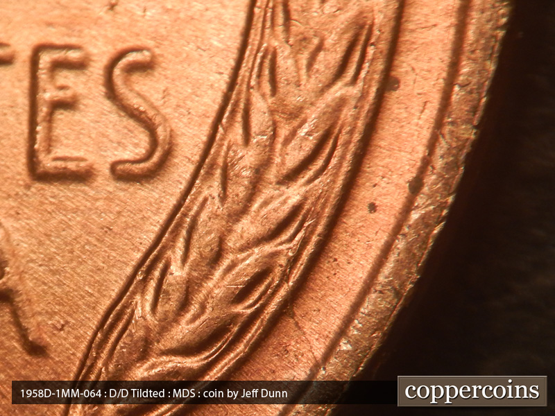 Die-stage B marker on 1958D•1MM•064 (1958 Repunched Mint Mark).