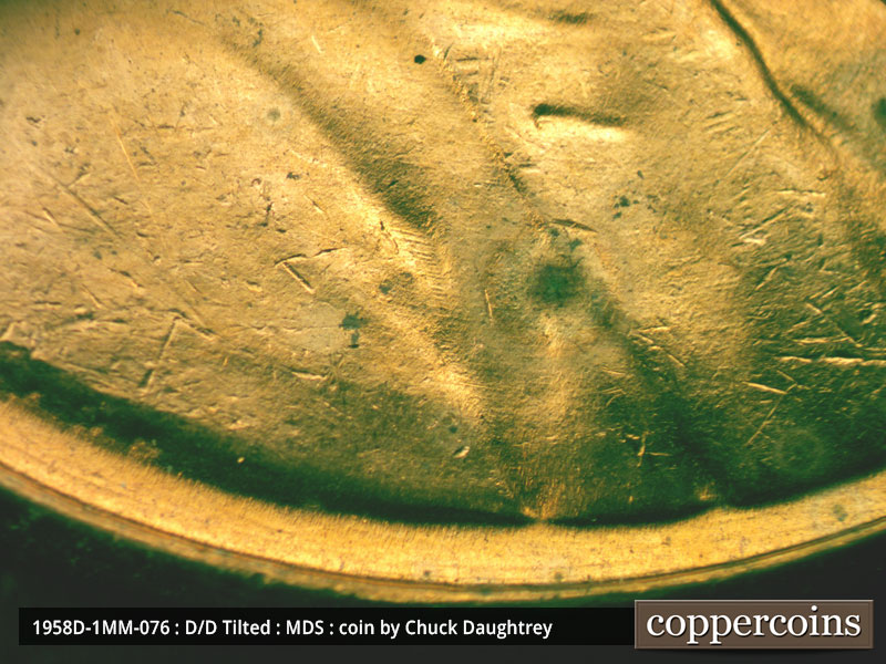 Die-stage B marker on 1958D•1MM•076 (1958 Repunched Mint Mark).