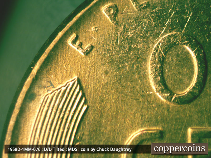 Die-stage B marker on 1958D•1MM•076 (1958 Repunched Mint Mark).