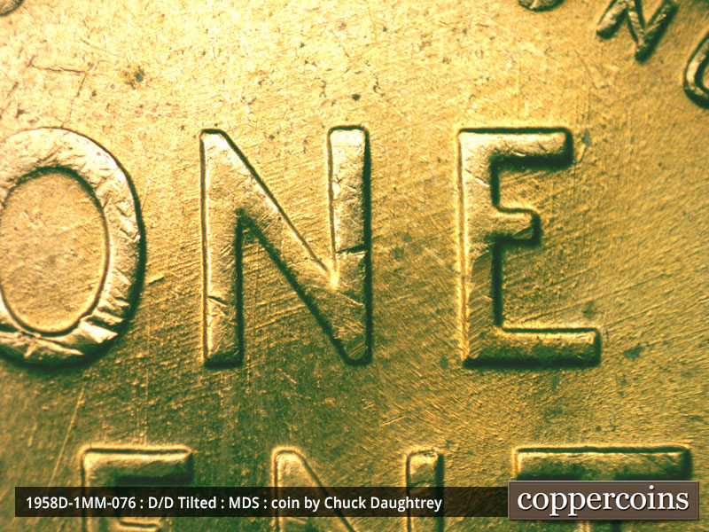 Die-stage B marker on 1958D•1MM•076 (1958 Repunched Mint Mark).