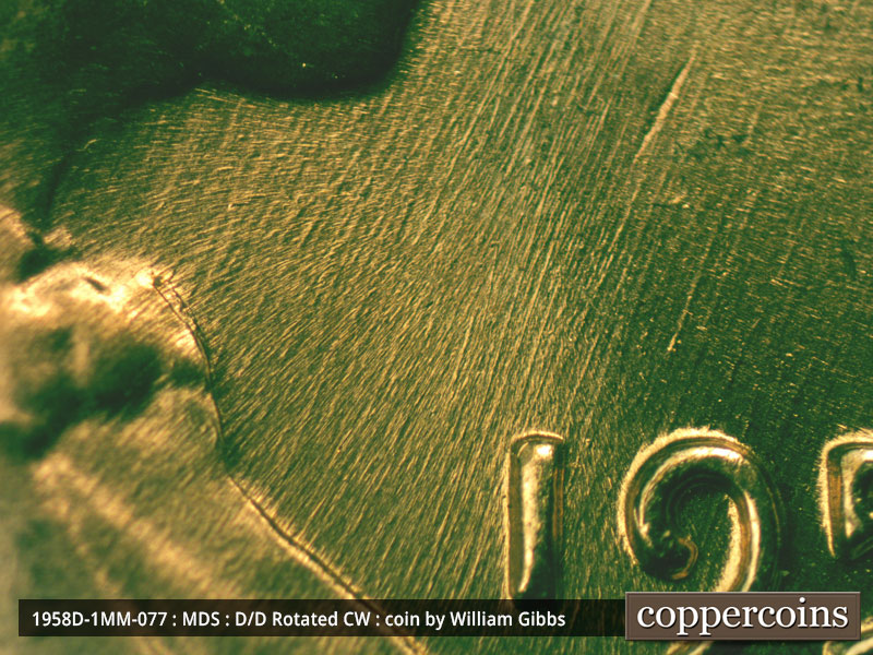 Die-stage B marker on 1958D•1MM•077 (1958 Repunched Mint Mark).