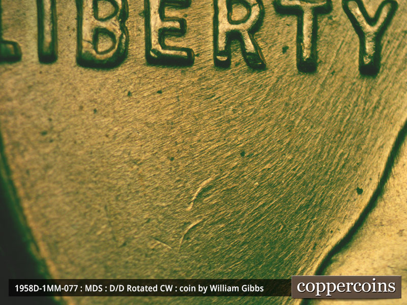 Die-stage B marker on 1958D•1MM•077 (1958 Repunched Mint Mark).