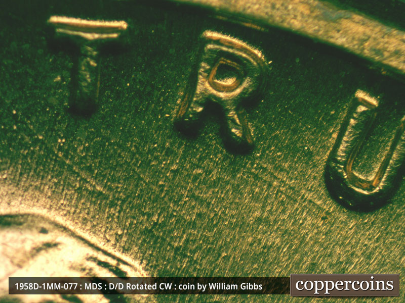Die-stage B marker on 1958D•1MM•077 (1958 Repunched Mint Mark).