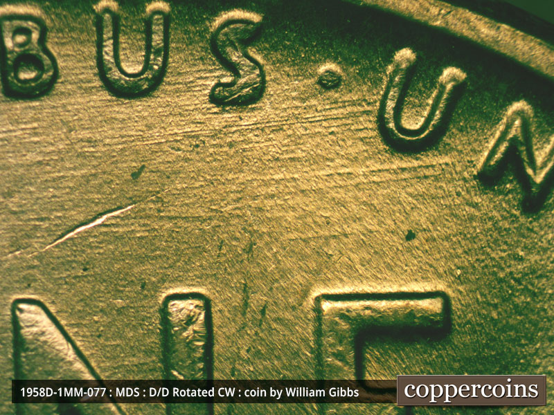 Die-stage B marker on 1958D•1MM•077 (1958 Repunched Mint Mark).