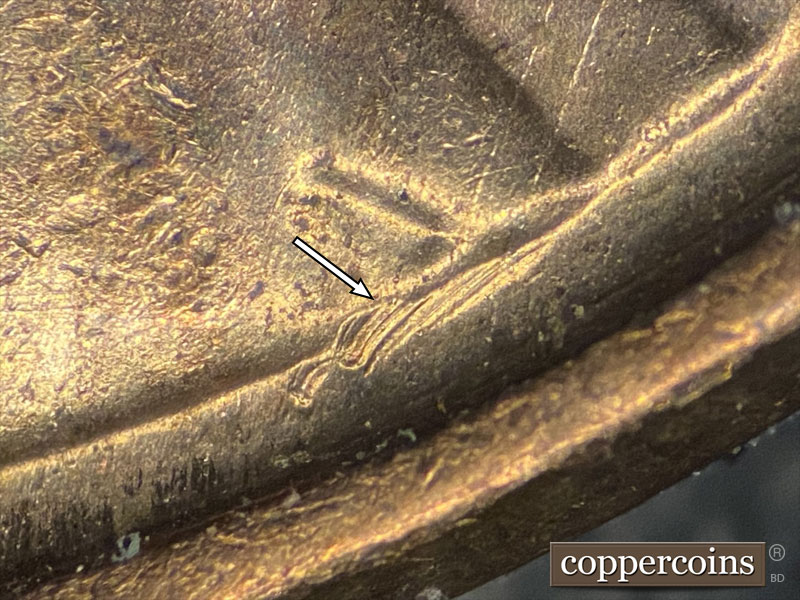 Die-stage B marker on 1958D•1MM•080 (1958 Repunched Mint Mark).