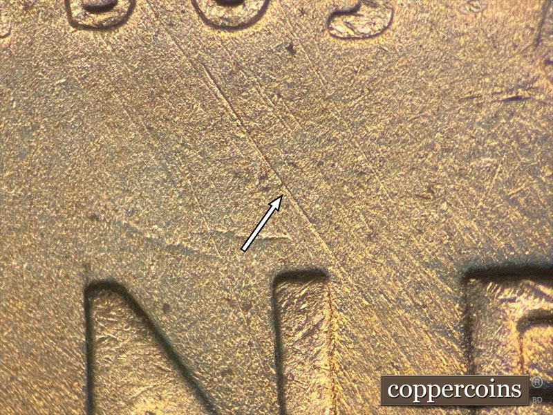 Die-stage B marker on 1958D•1MM•080 (1958 Repunched Mint Mark).