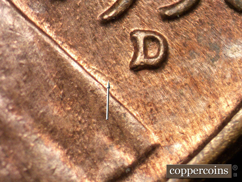 Die-stage B marker on 1958D•1MM•083 (1958 Repunched Mint Mark).