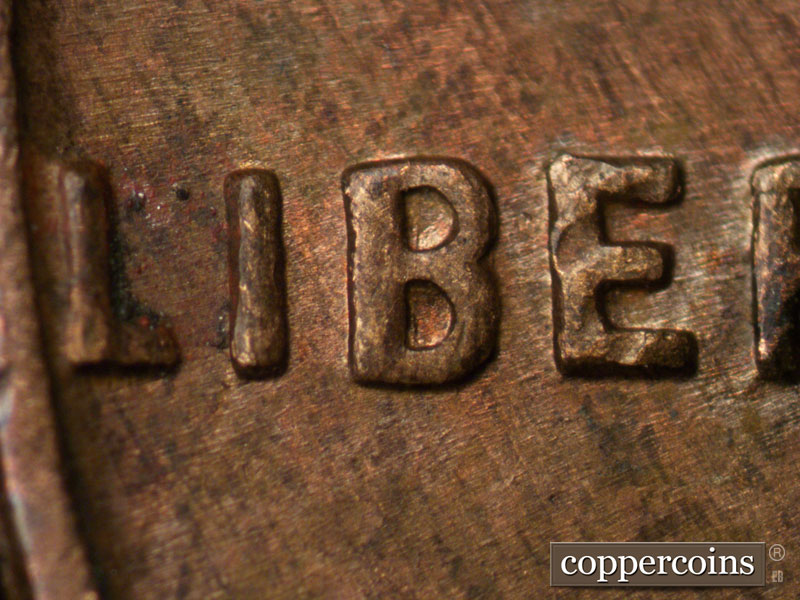 Die-stage B marker on 1958D•1MM•083 (1958 Repunched Mint Mark).