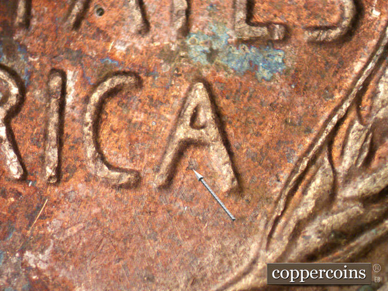 Die-stage B marker on 1958D•1MM•083 (1958 Repunched Mint Mark).