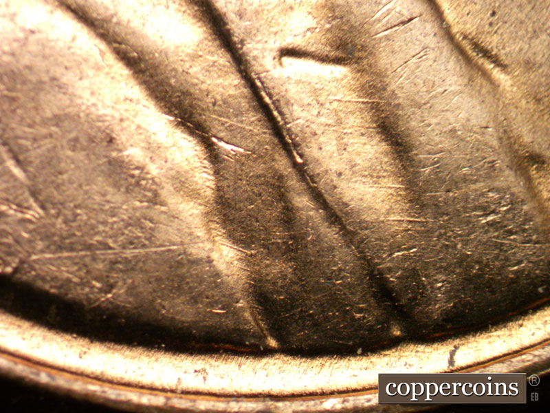 Die-stage B marker on 1958D•1MM•084 (1958 Repunched Mint Mark).