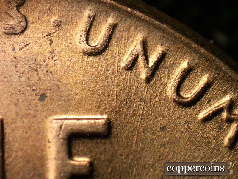 Die-stage B marker on 1958D•1MM•084 (1958 Repunched Mint Mark).