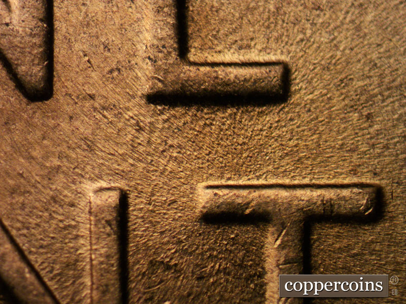 Die-stage B marker on 1958D•1MM•084 (1958 Repunched Mint Mark).