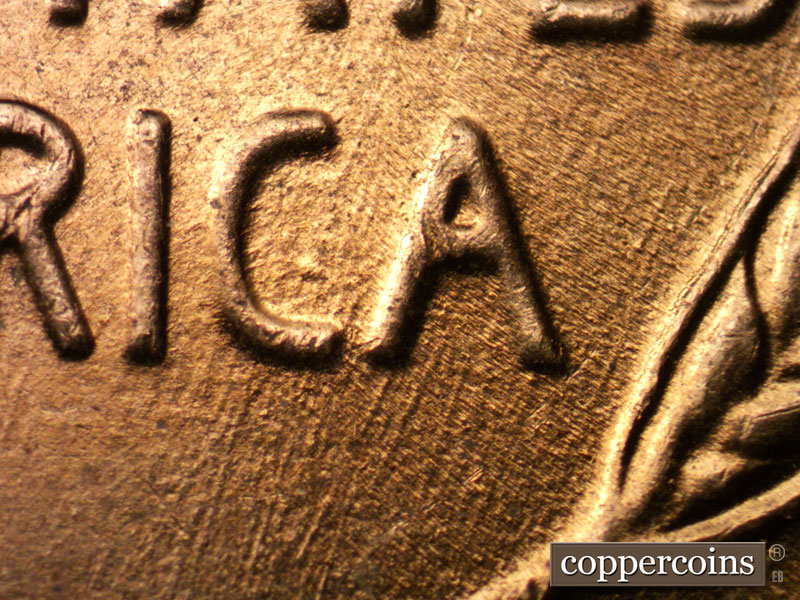 Die-stage B marker on 1958D•1MM•084 (1958 Repunched Mint Mark).
