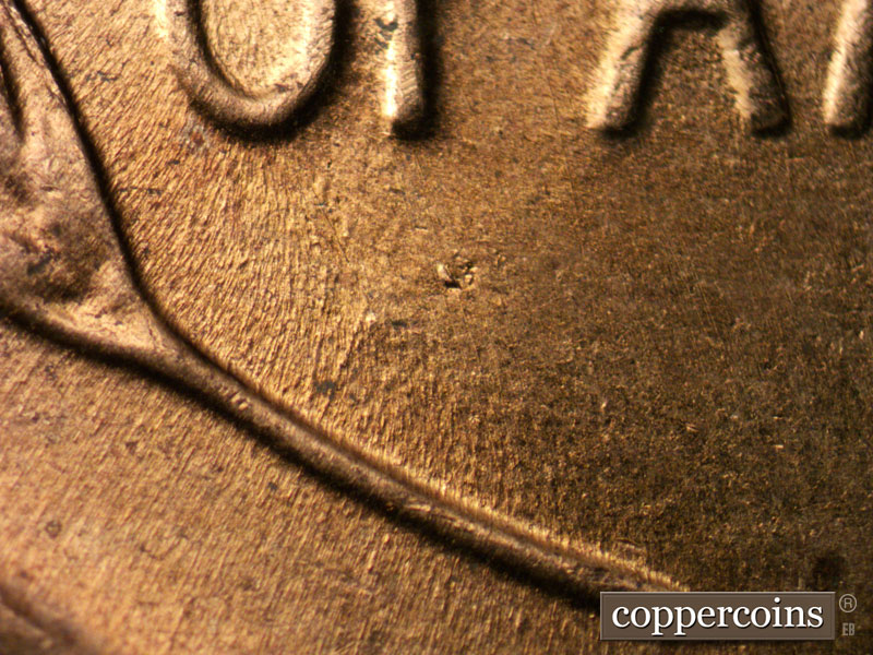 Die-stage B marker on 1958D•1MM•084 (1958 Repunched Mint Mark).