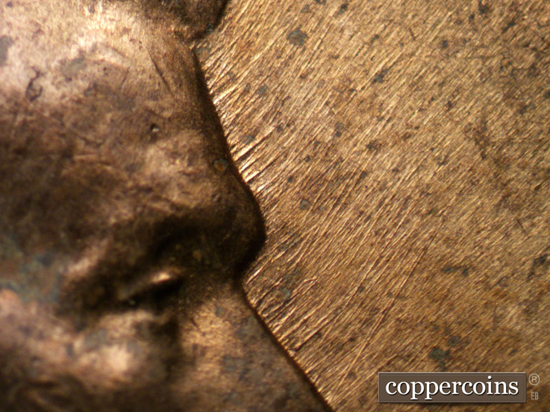 Die-stage B marker on 1958D•1MM•085 (1958 Repunched Mint Mark).