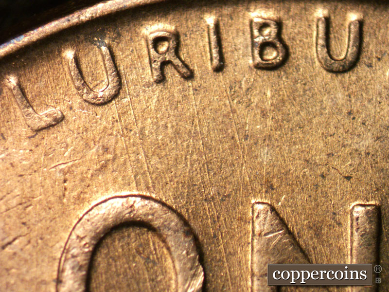 Die-stage B marker on 1958D•1MM•085 (1958 Repunched Mint Mark).
