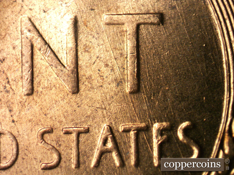 Die-stage B marker on 1958D•1MM•085 (1958 Repunched Mint Mark).