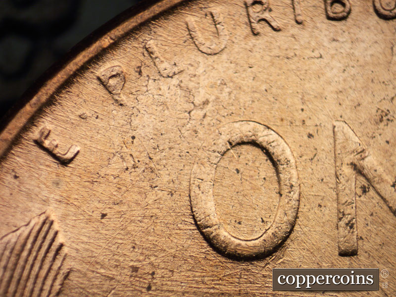 Die-stage B marker on 1958D•1MM•087 (1958 Repunched Mint Mark).