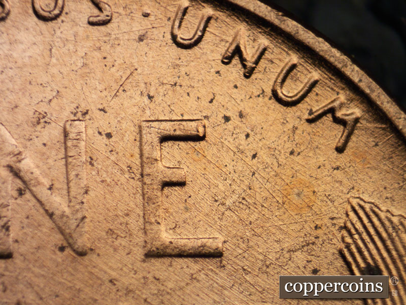 Die-stage B marker on 1958D•1MM•087 (1958 Repunched Mint Mark).