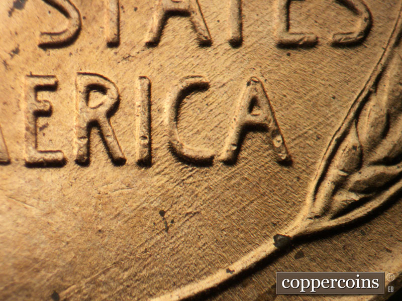 Die-stage B marker on 1958D•1MM•090 (1958 Repunched Mint Mark).