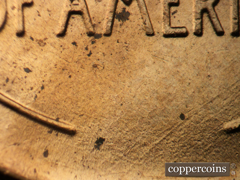 Die-stage B marker on 1958D•1MM•090 (1958 Repunched Mint Mark).