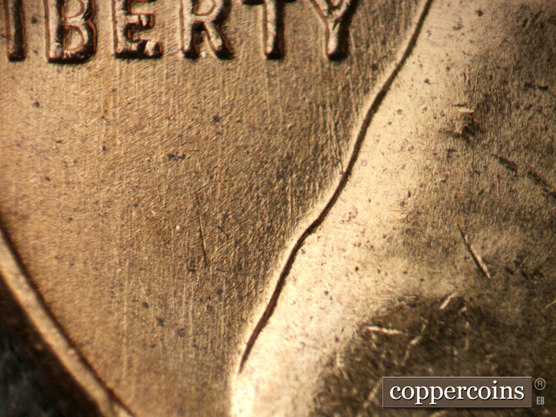 Die-stage B marker on 1958D•1MM•092 (1958 Repunched Mint Mark).