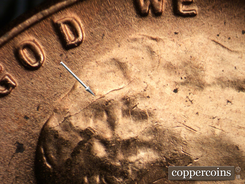 Die-stage B marker on 1958D•1MM•099 (1958 Repunched Mint Mark).