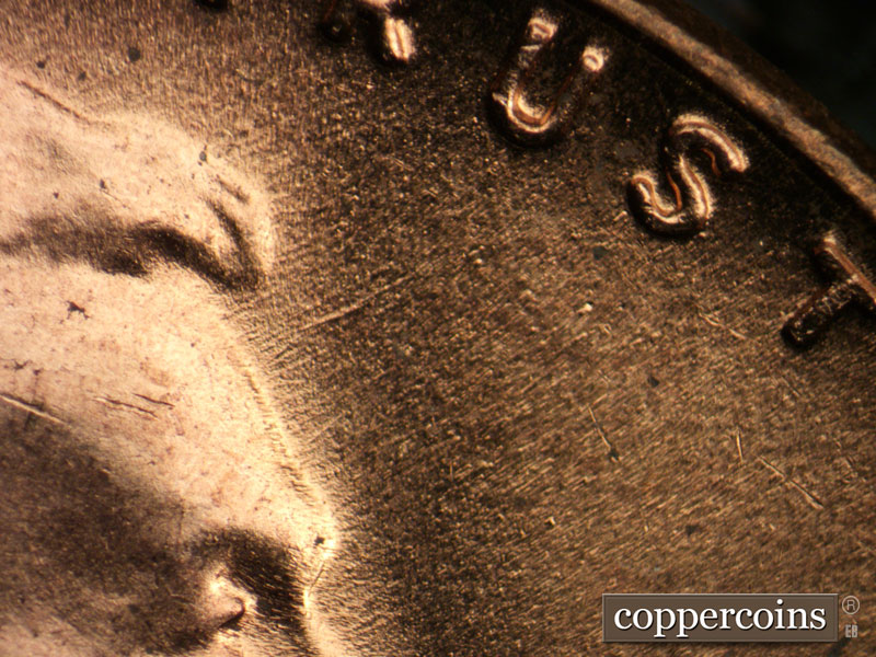 Die-stage B marker on 1958D•1MM•099 (1958 Repunched Mint Mark).