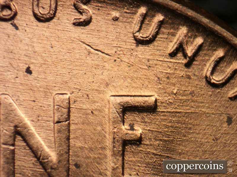 Die-stage B marker on 1958D•1MM•099 (1958 Repunched Mint Mark).