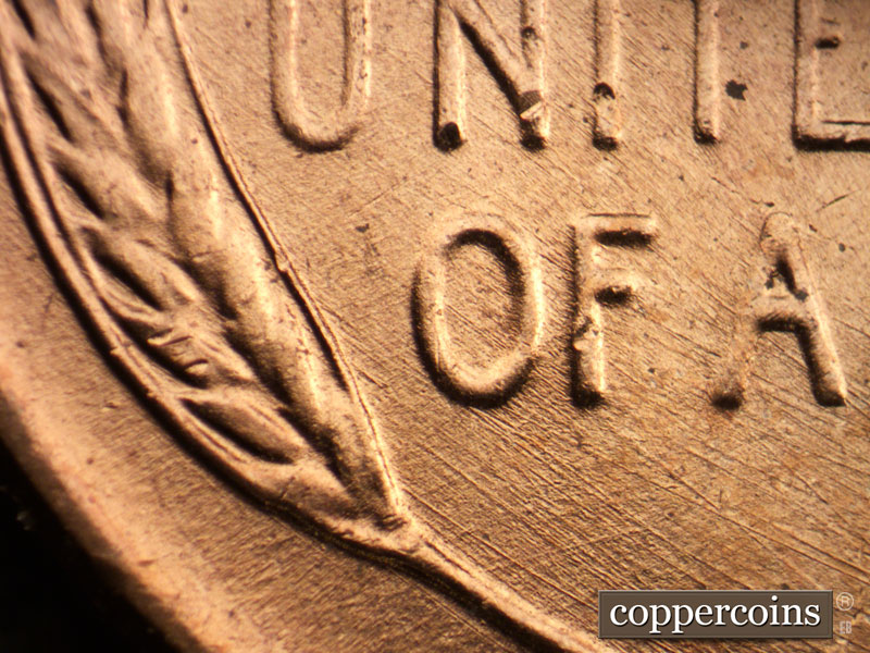 Die-stage B marker on 1958D•1MM•099 (1958 Repunched Mint Mark).
