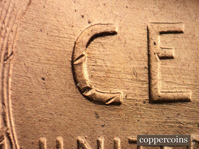 Die-stage B marker on 1958D•1MM•099 (1958 Repunched Mint Mark).