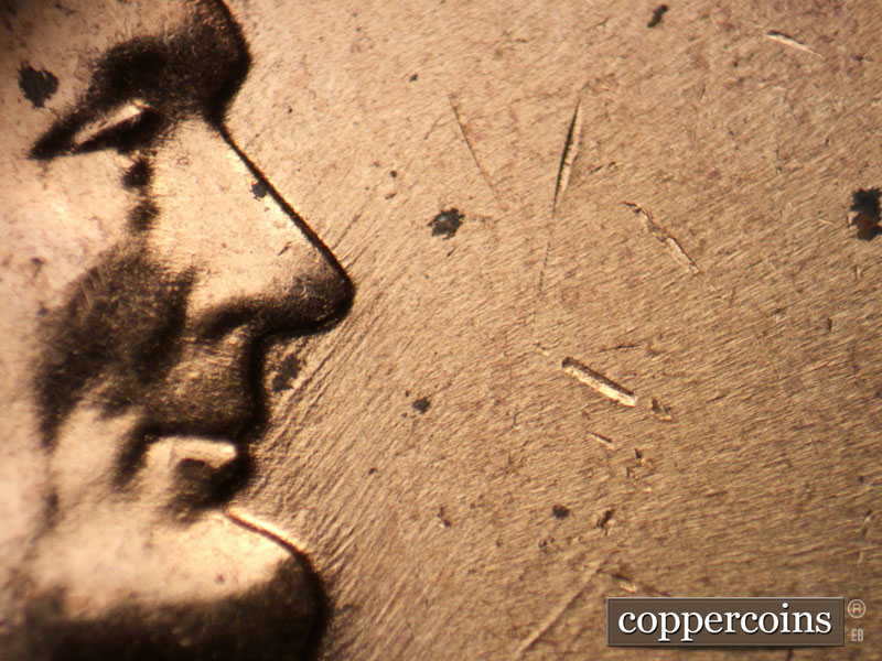 Die-stage B marker on 1958D•1MM•100 (1958 Repunched Mint Mark).