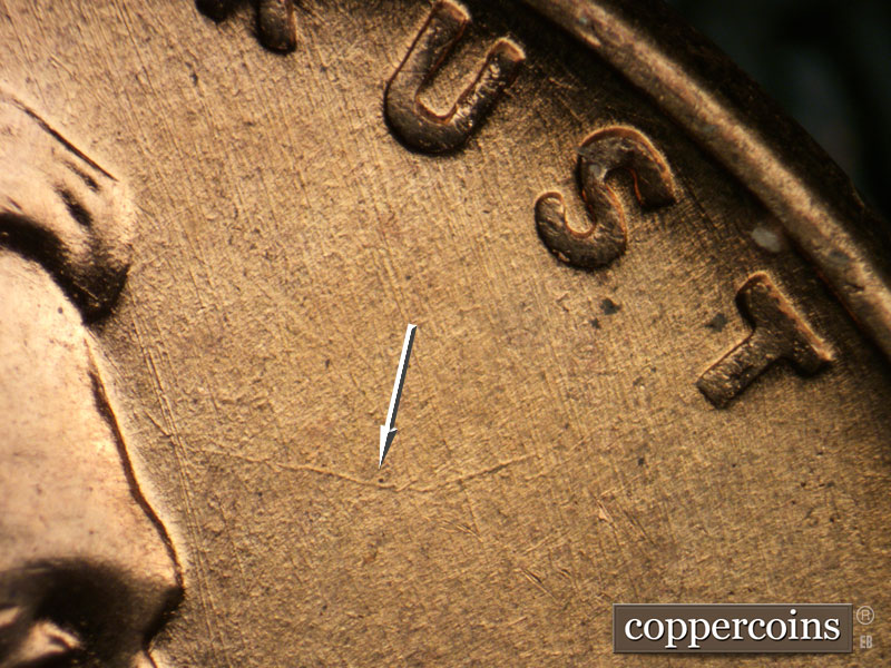 Die-stage A marker on 1958D•1MM•103 (1958 Repunched Mint Mark).