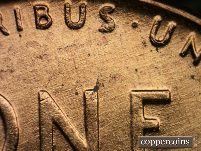 Die-stage A marker on 1958D•1MM•103 (1958 Repunched Mint Mark).