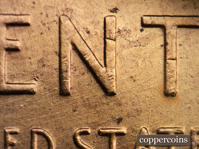 Die-stage A marker on 1958D•1MM•103 (1958 Repunched Mint Mark).
