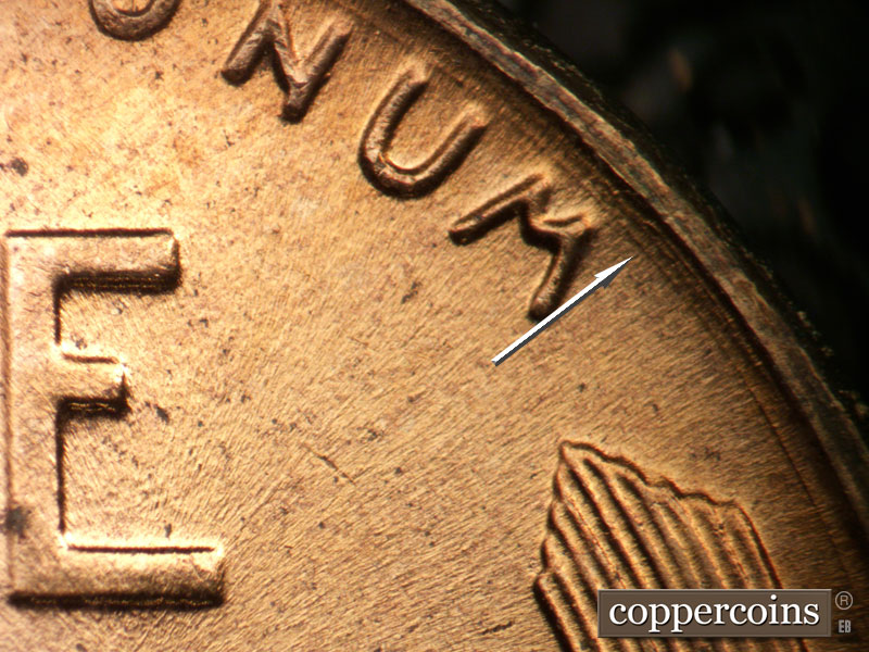 Die-stage B marker on 1958D•1MM•104 (1958 Repunched Mint Mark).