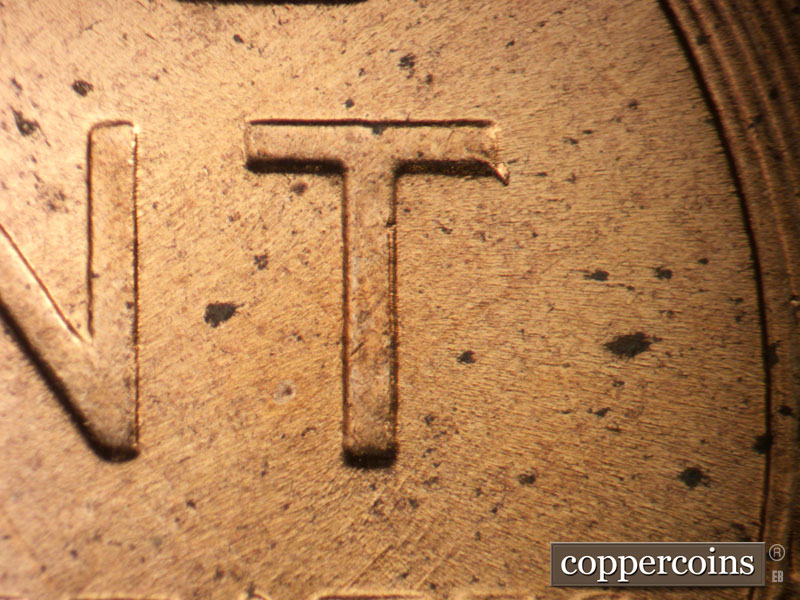 Die-stage B marker on 1958D•1MM•104 (1958 Repunched Mint Mark).