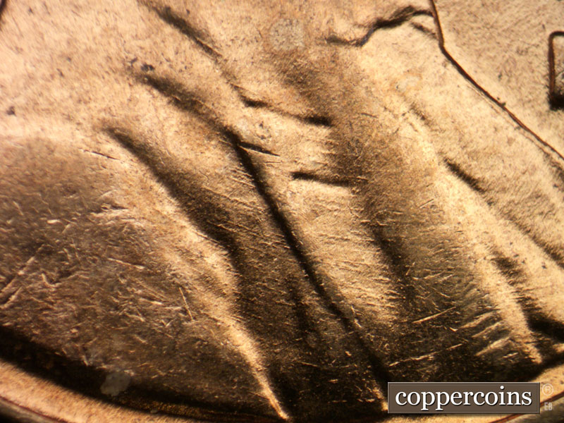 Die-stage B marker on 1958D•1MM•105 (1958 Repunched Mint Mark).