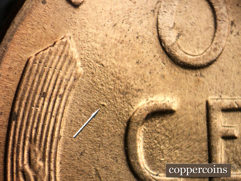 Die-stage B marker on 1958D•1MM•105 (1958 Repunched Mint Mark).