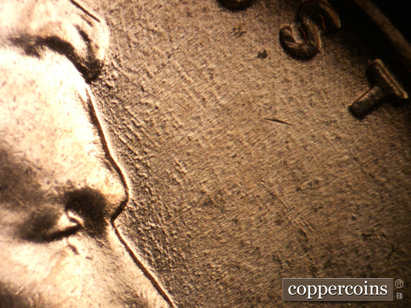 Die-stage B marker on 1958D•1MM•106 (1958 Repunched Mint Mark).