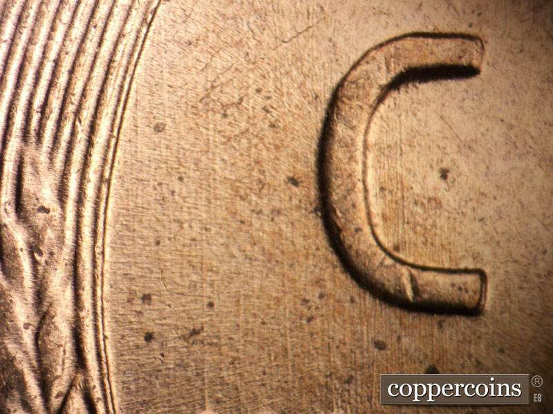 Die-stage B marker on 1958D•1MM•106 (1958 Repunched Mint Mark).
